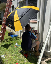 Load image into Gallery viewer, An Australian Tradie Working In The Shade Underneath The Trade Shade - The Square Umbrella.